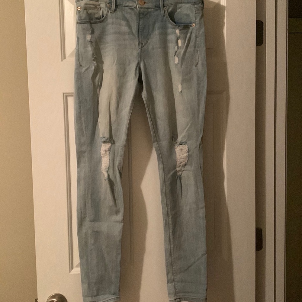 Express distressed jean leggings. Mid rise. Size 8R